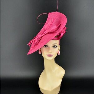 Vibrant Pink Fascinator Hat with Dramatic Curves